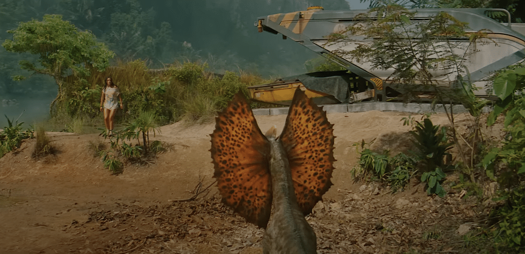 Teresa Delgado coming across a Dilophosaurus.